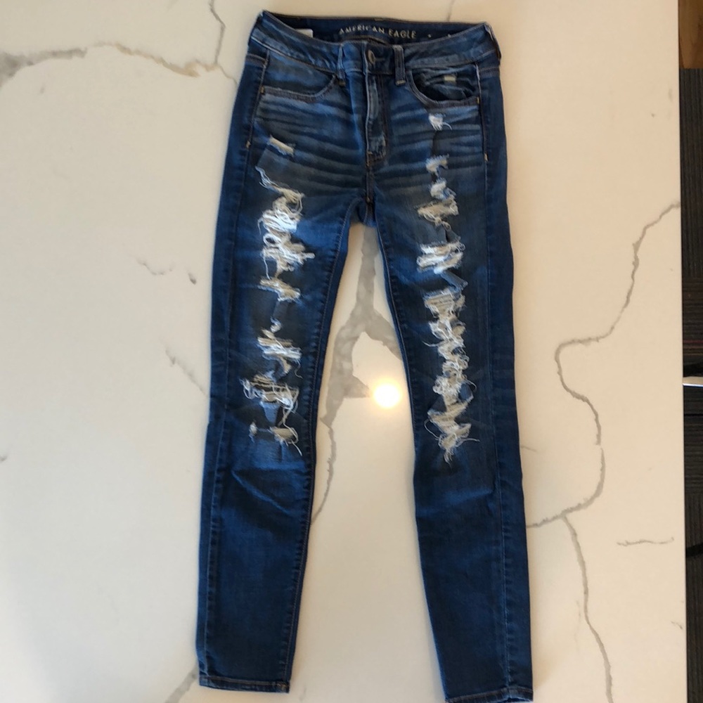 American Eagle, dark washed, distressed jean